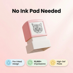 Stamp with a cat design on a pink background, featuring text 'No Ink Pad Needed'.